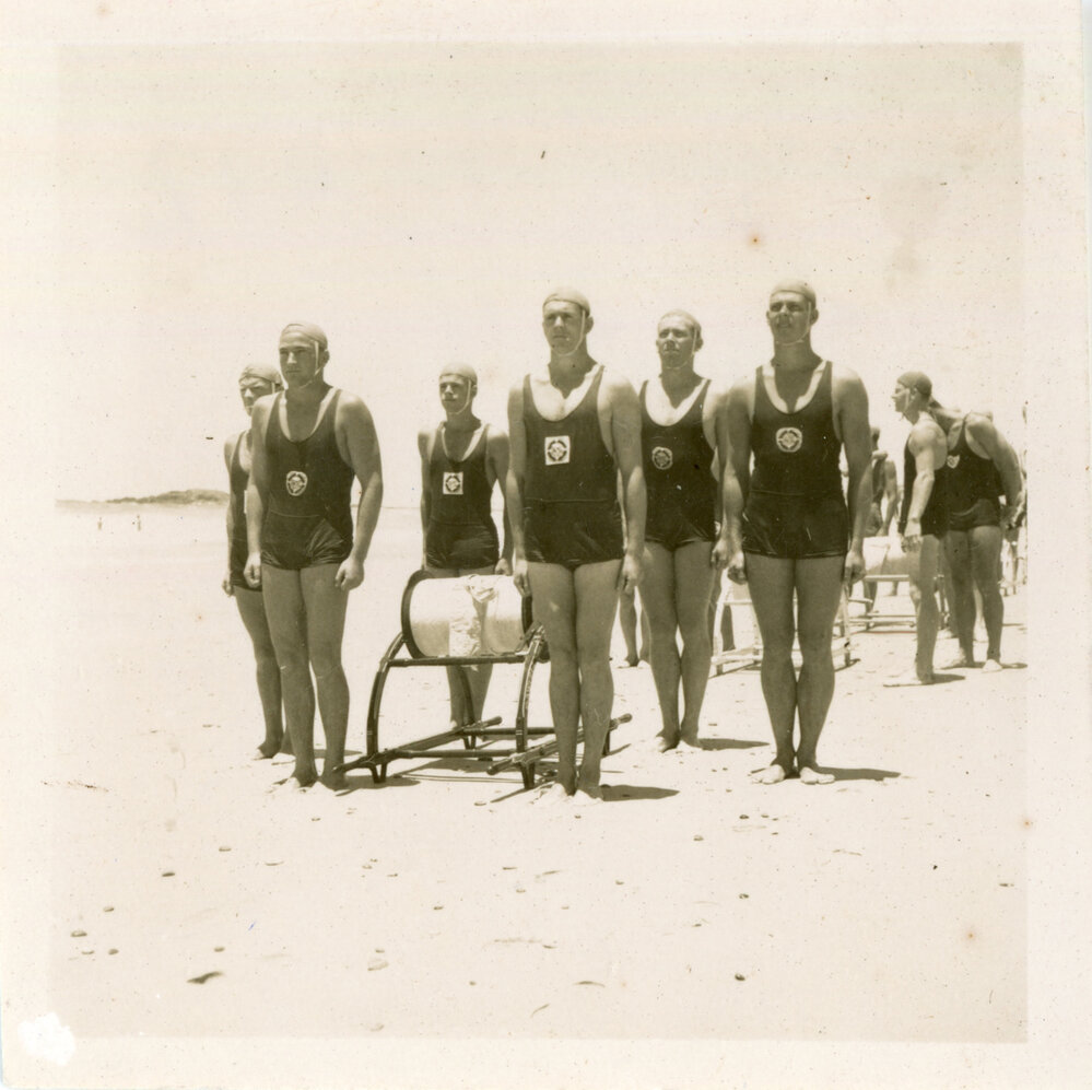 Men's surf life-saving team at a carnival