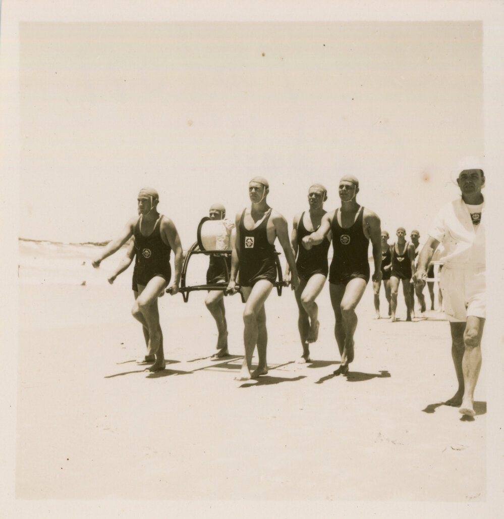Men's surf life-saving team at a carnival