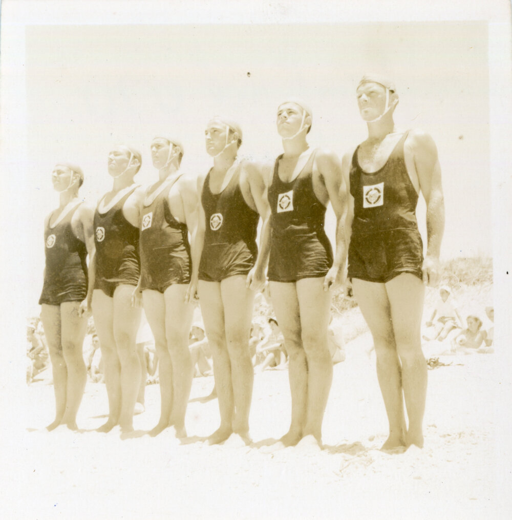Men's surf life-saving team at a carnival