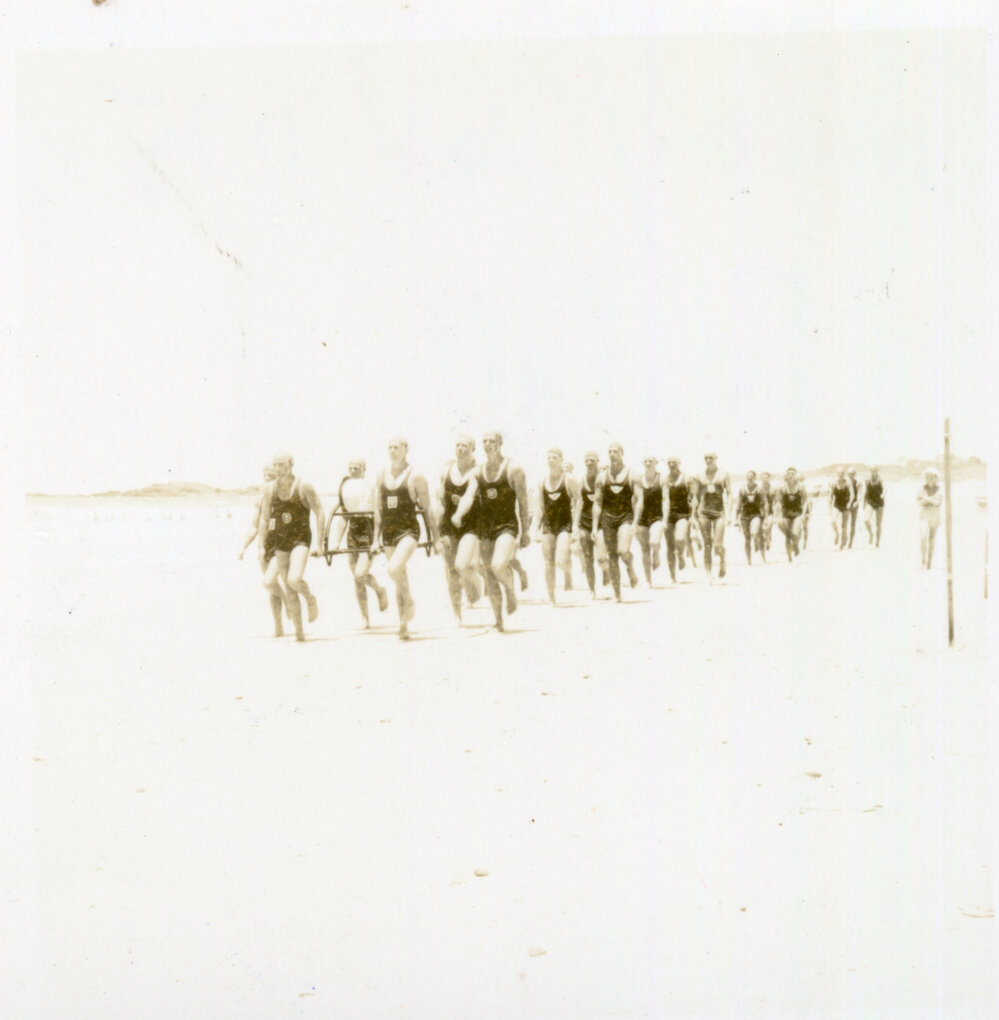 Men's surf life-saving team at a carnival