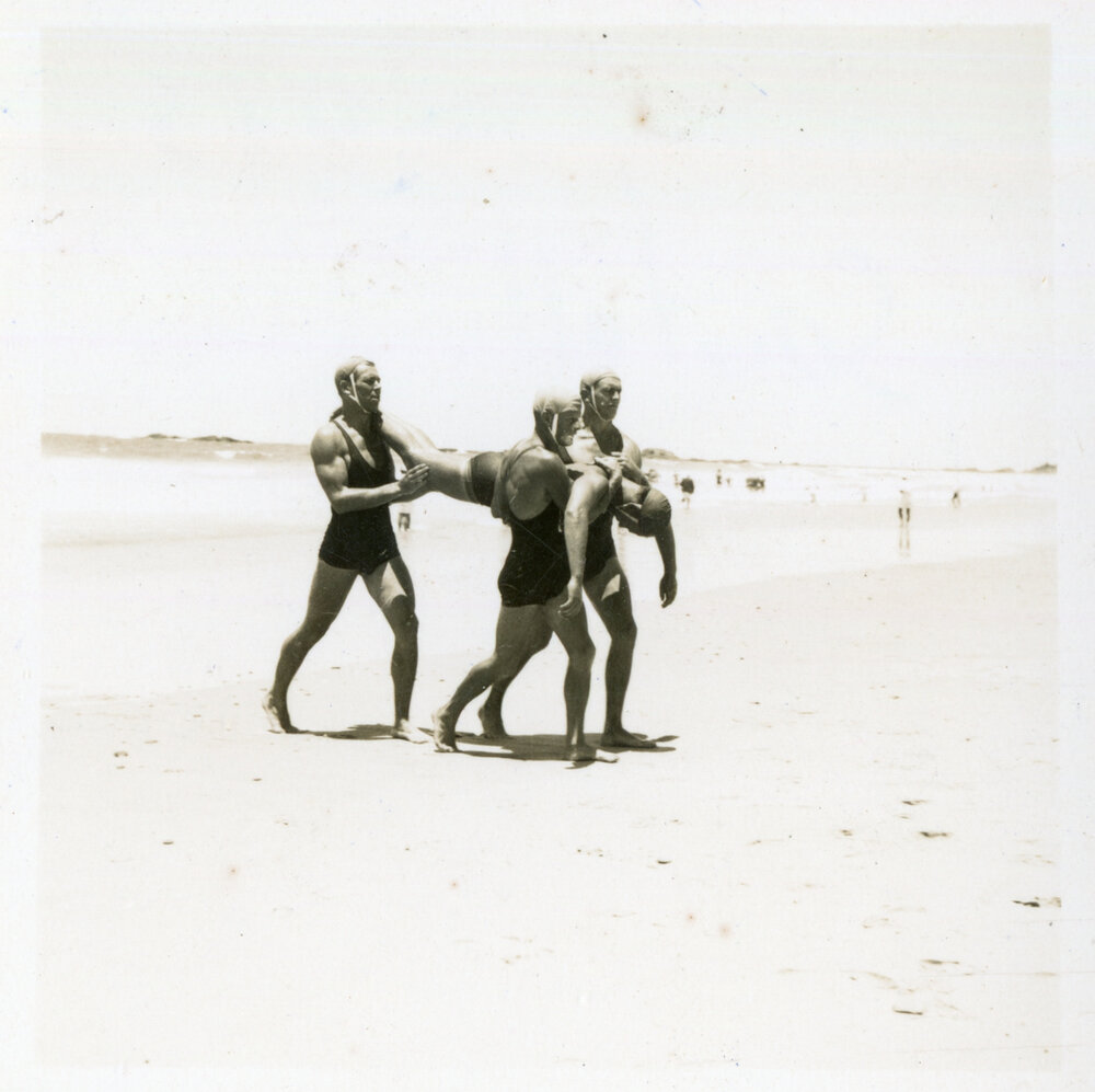 Men's surf life-saving team at a carnival