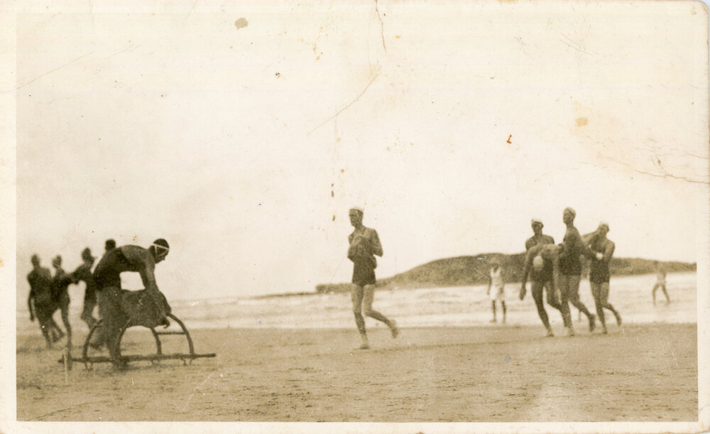 Men's surf-lifesaving team in action