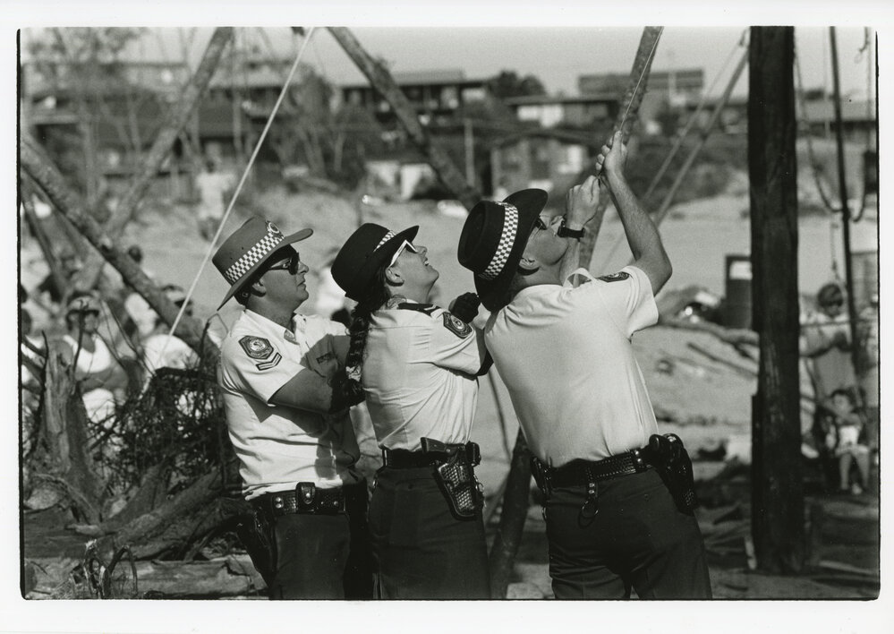 Police shake a tripod at the Look-At-Me-Now protest, November 1991