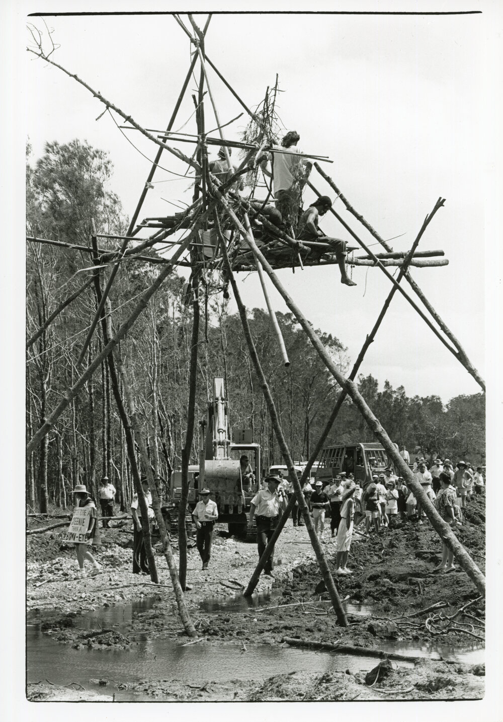 Police and machinery close in on a tripod at the Look-At-Me-Now outfall protest, November 1991