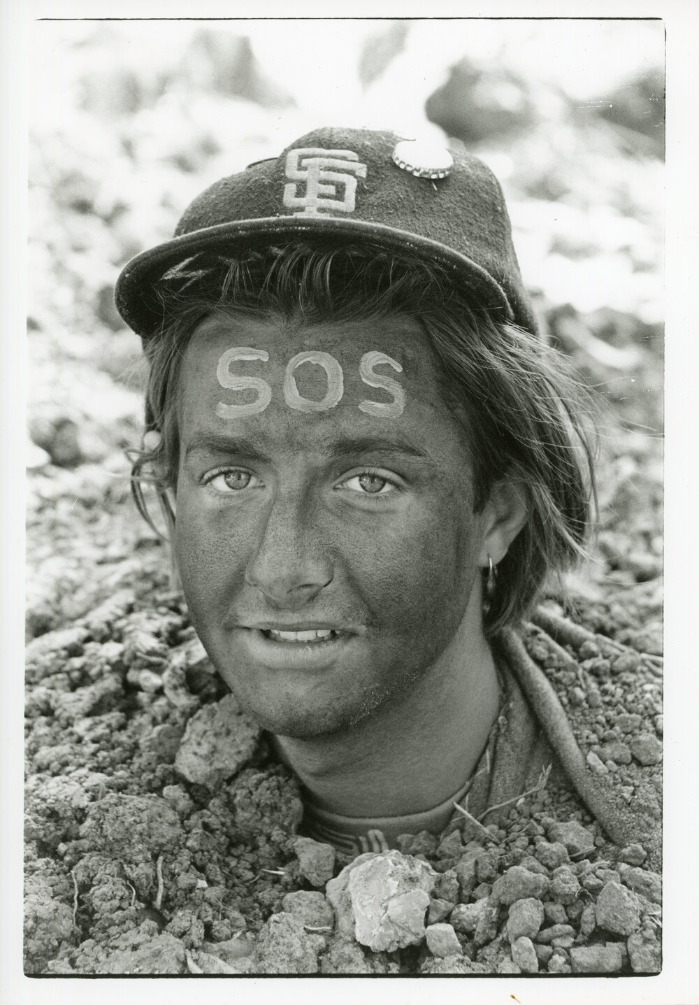 Protester buried to stop heavy machinery at the Look-At-Me-Now outfall protest, November 1991