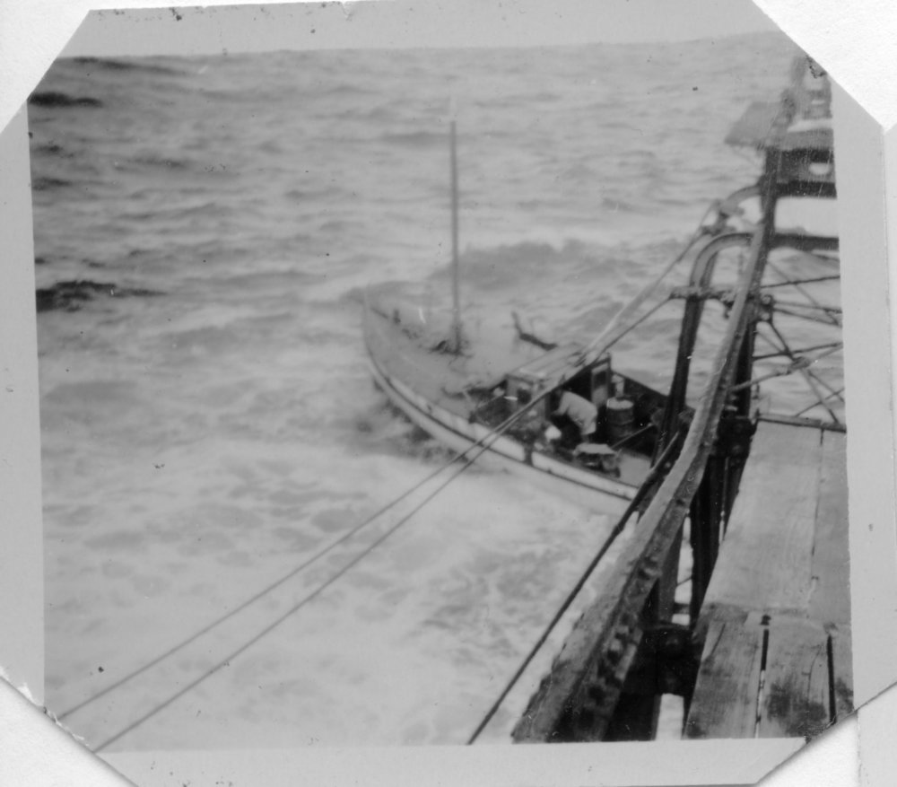 Trying to unload in rough seas at South Solitary Island, 1951
