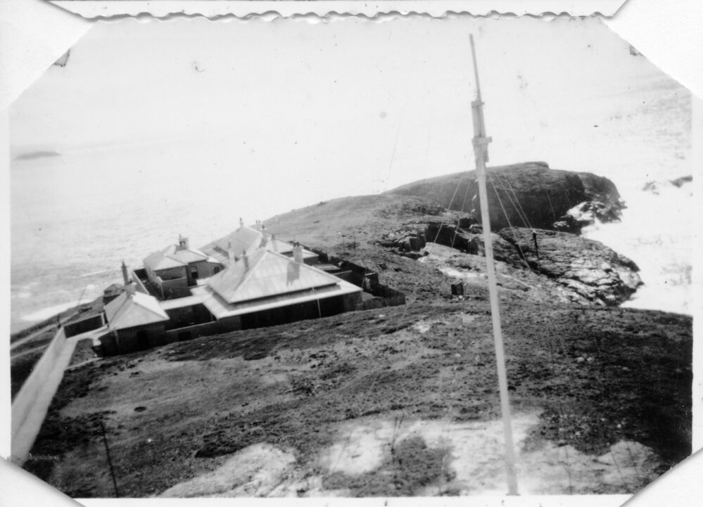 Lightkeepers' cottages and flagstaff radio tower on South Solitary Island, 1951