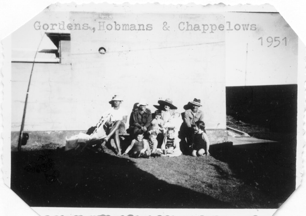 Lightkeeper families outside their cottages on South Solitary Island, 1951