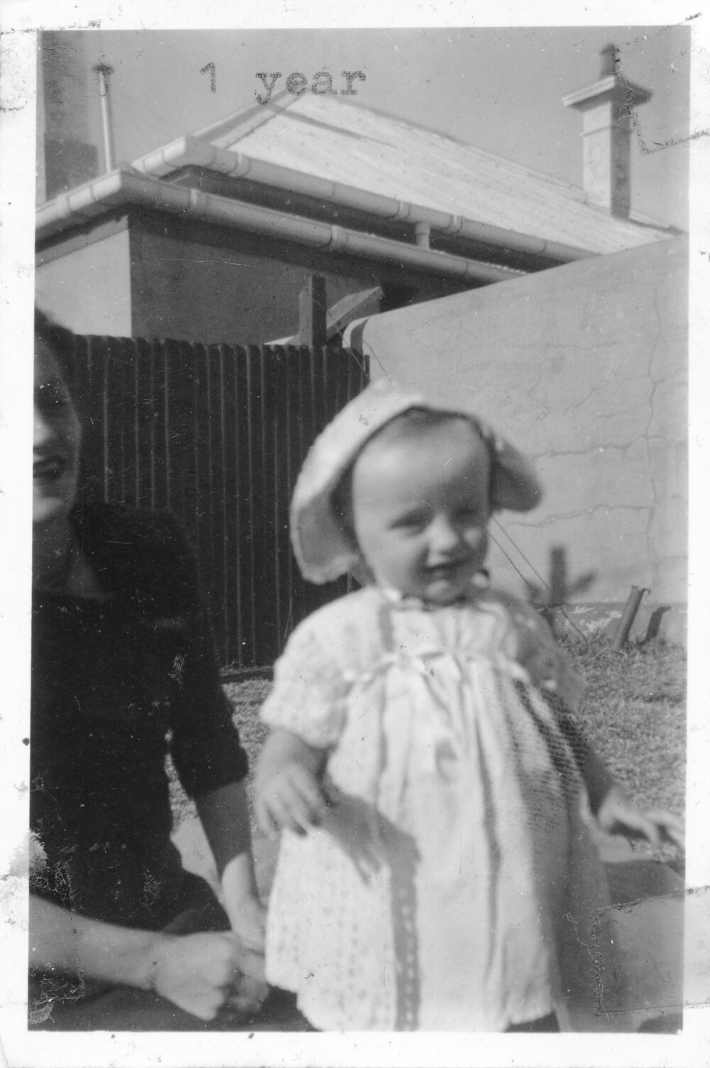 Linda Hobman outside the residential cottage on South Solitary Island, 1953