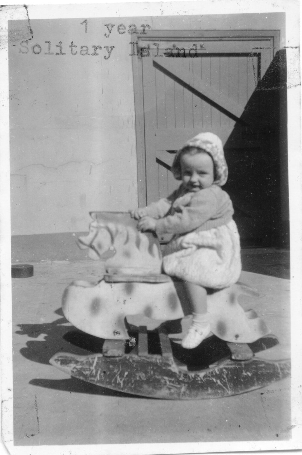 Linda Hobman on her rocking horse at South Solitary Island, 1953