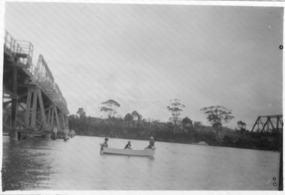 Rob and Hugh Nicol with cousin Lyndal Fowler on the Kalang River between the bridges, 1950s
