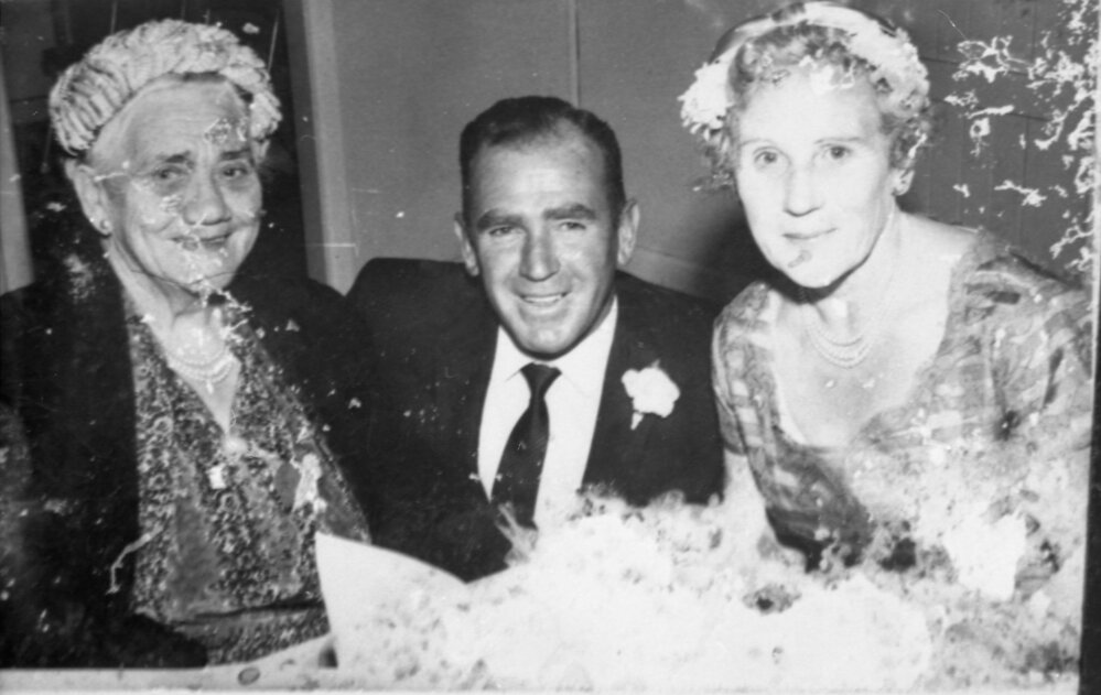Elizabeth Bray with Terry and Dora Smith at the farm, c.1955