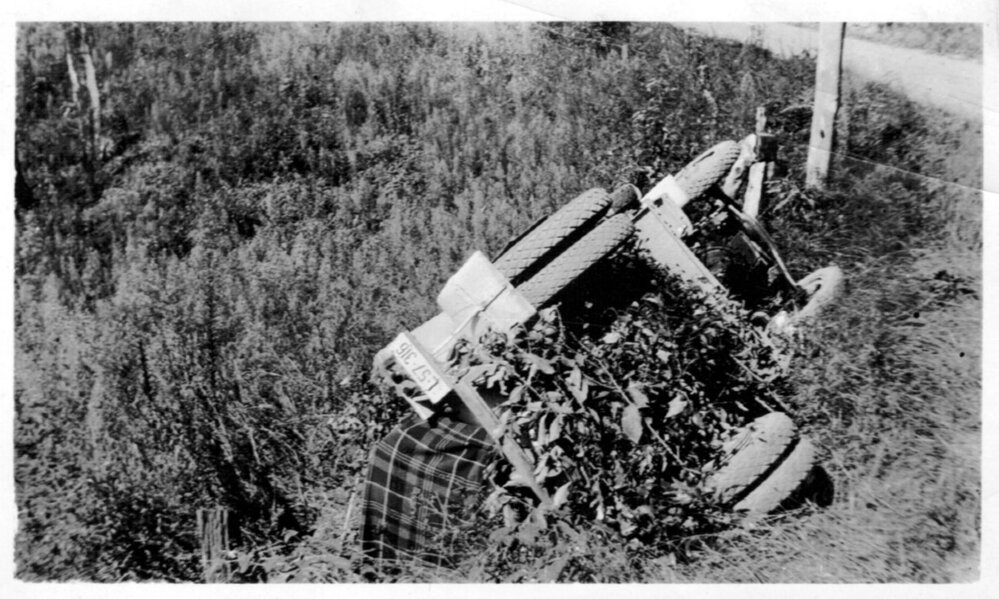 An overturned lorry where the road side gave way, 1938