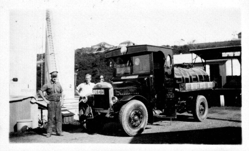  David Nicol and co-worker beside the Denis 600 gallon fuel tanker at the Coffs Jetty Depot, 1930s
