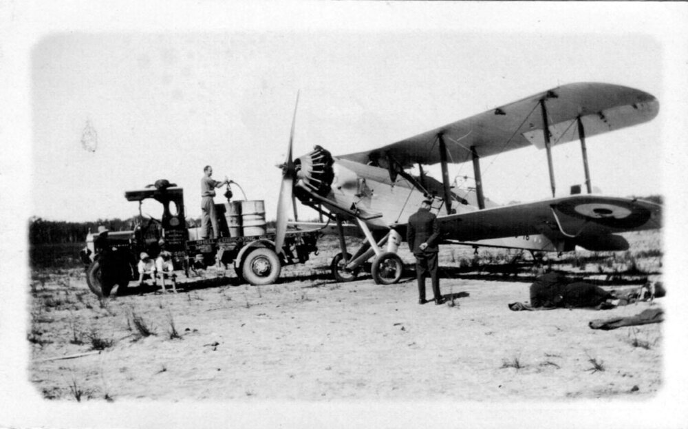 David Nicol refuelling an RAAF Westland Wapiti aeroplane at Coffs Harbour Aerodrome, 1930s