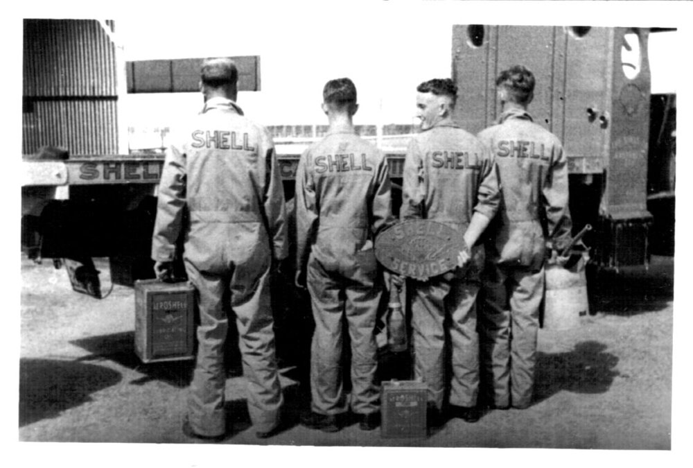 David Nicol with Sid Cockle and crew at the Shell Depot near Coffs Jetty, 1930s