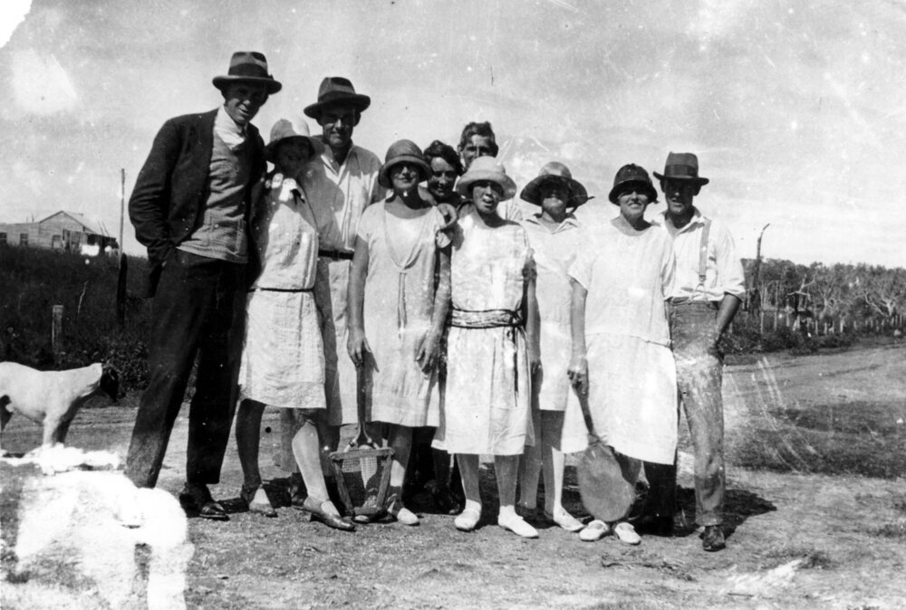 Tennis players in front of Oswald Sawtell's home