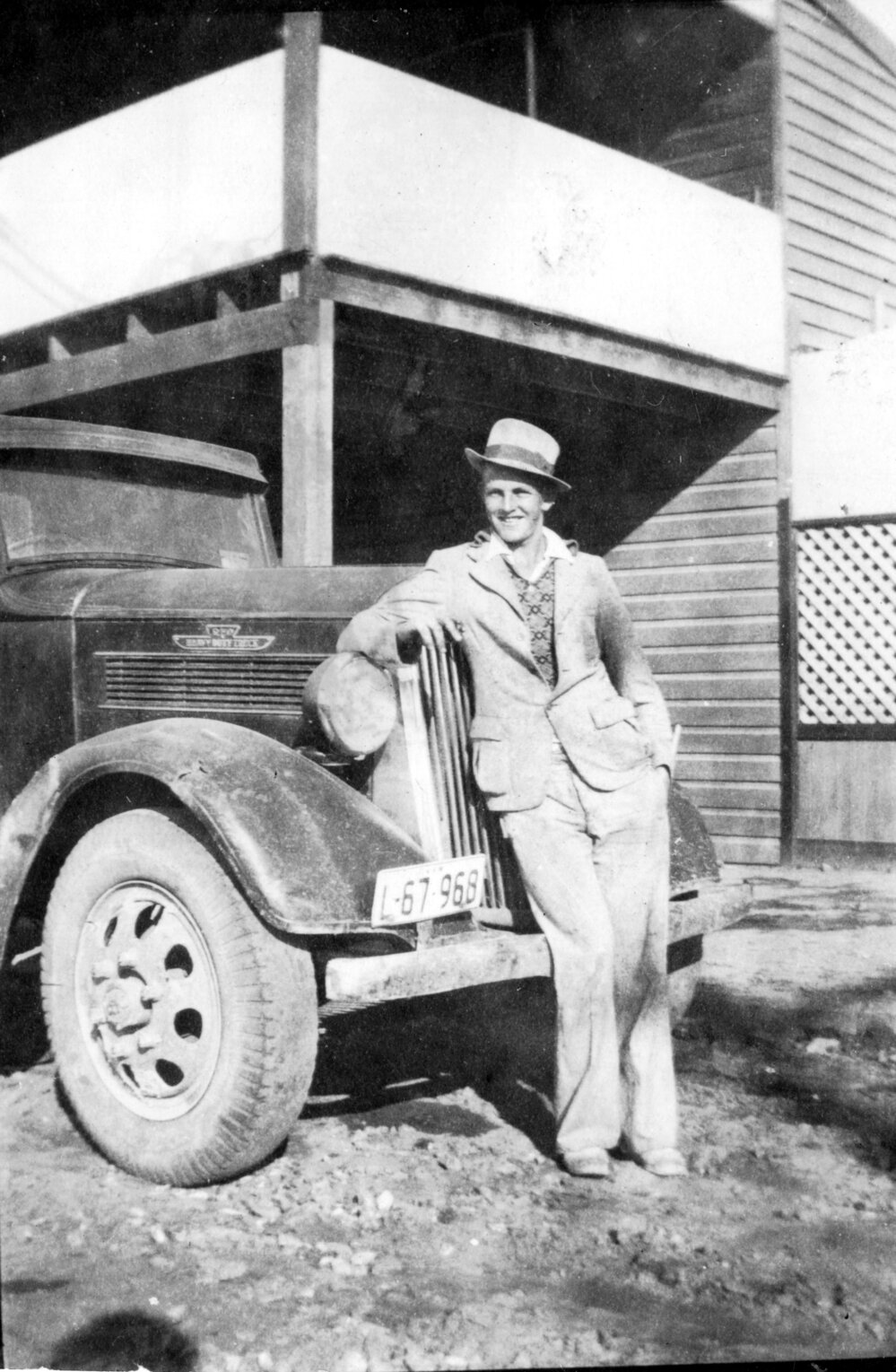 Jim Cockbain outside Cockbain's boarding house on First Avenue