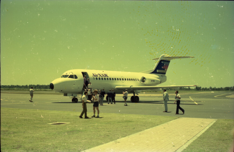 Passengers disembarking from an Air N.S.W. F28 jet, 11 December 1986
