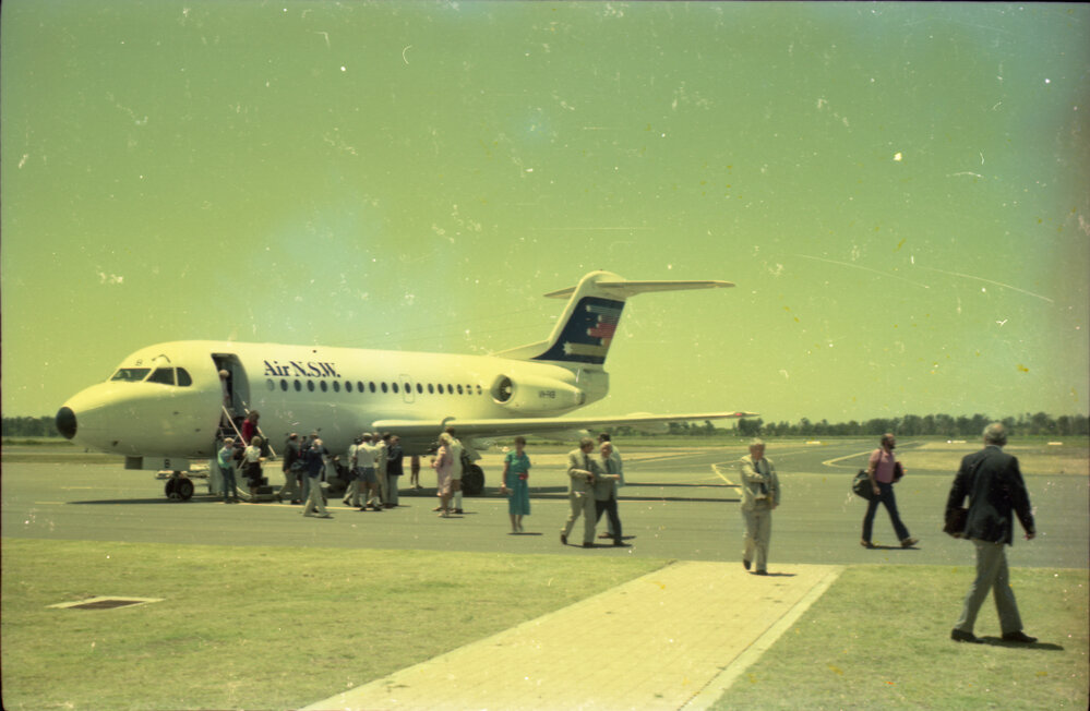 Passengers disembarking from an Air N.S.W. F28 jet, 11 December 1986