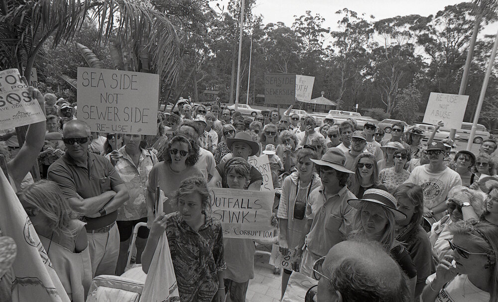 Protestors meet outside the City Council's Administration building, late 1991