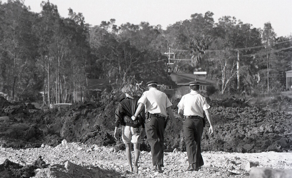 Police arrest a protestor, 25 November 1991