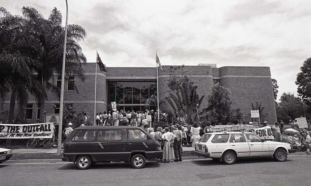 Protestors meet outside the City Council's Administration building, late 1991