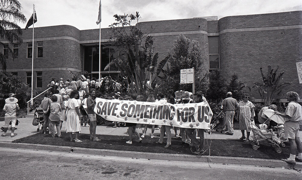 Protestors meet outside the City Council's Administration building, late 1991