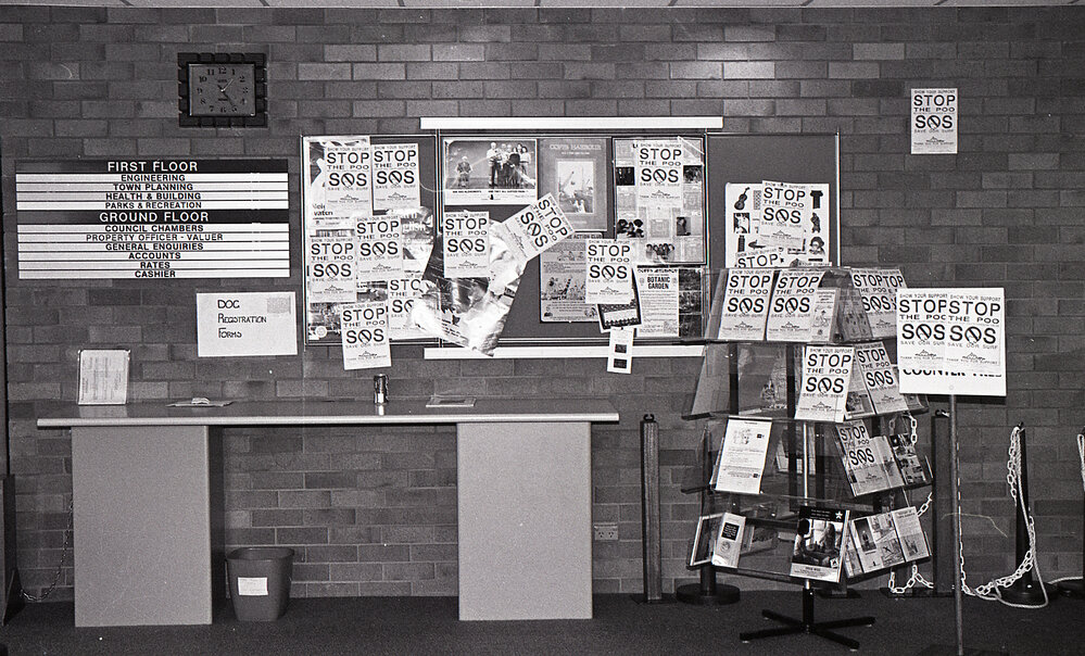Protest signs inside the City Council's Administration building, late 1991