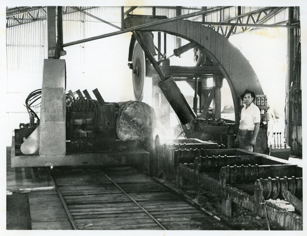 Log going through the Isles Forge breaking down saw auto trailer out