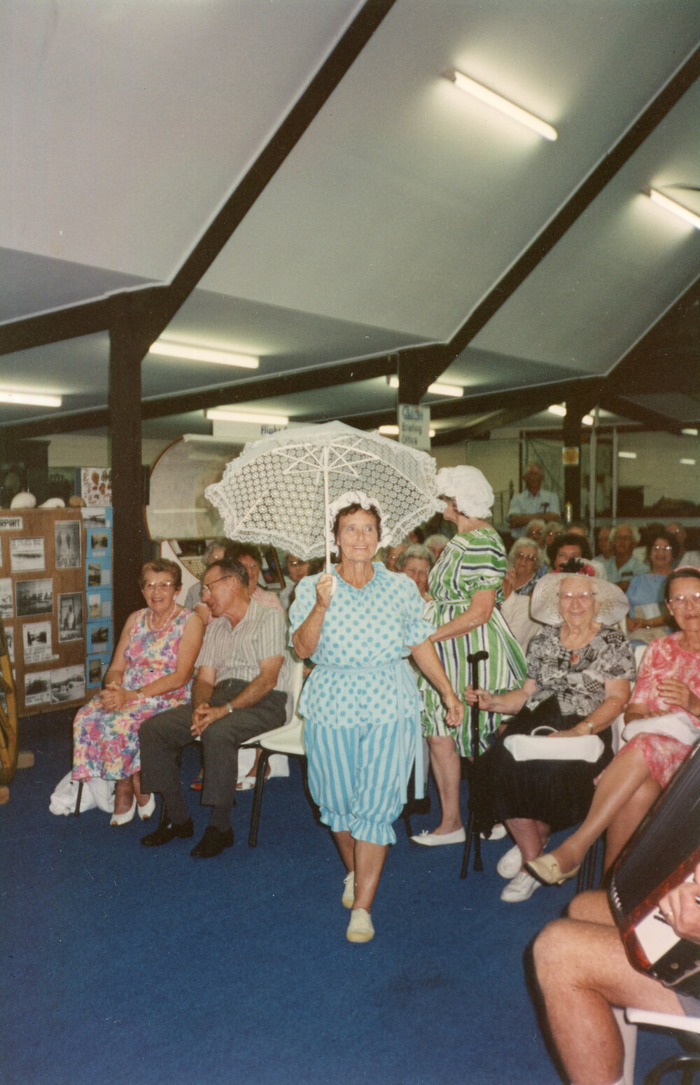 Women's bathing costume with parasol, 7 April 1993