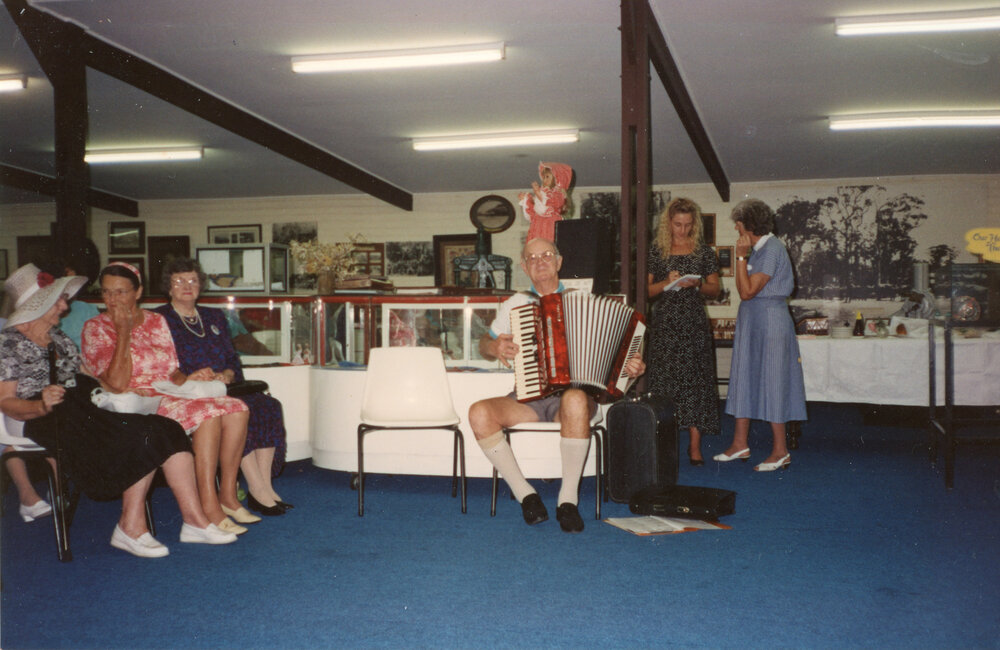 Piano accordion player at the Regional Museum, 7 April 1993