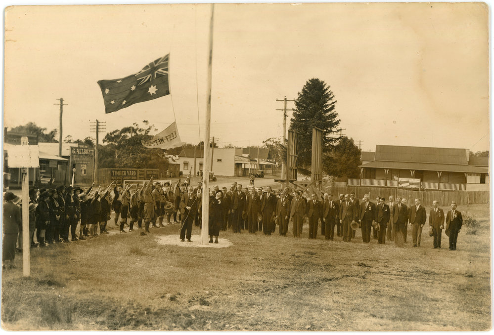 Flag-raising at the ANZAC Day ceremony on the corner of High and Castle Streets, 25 April 1937 