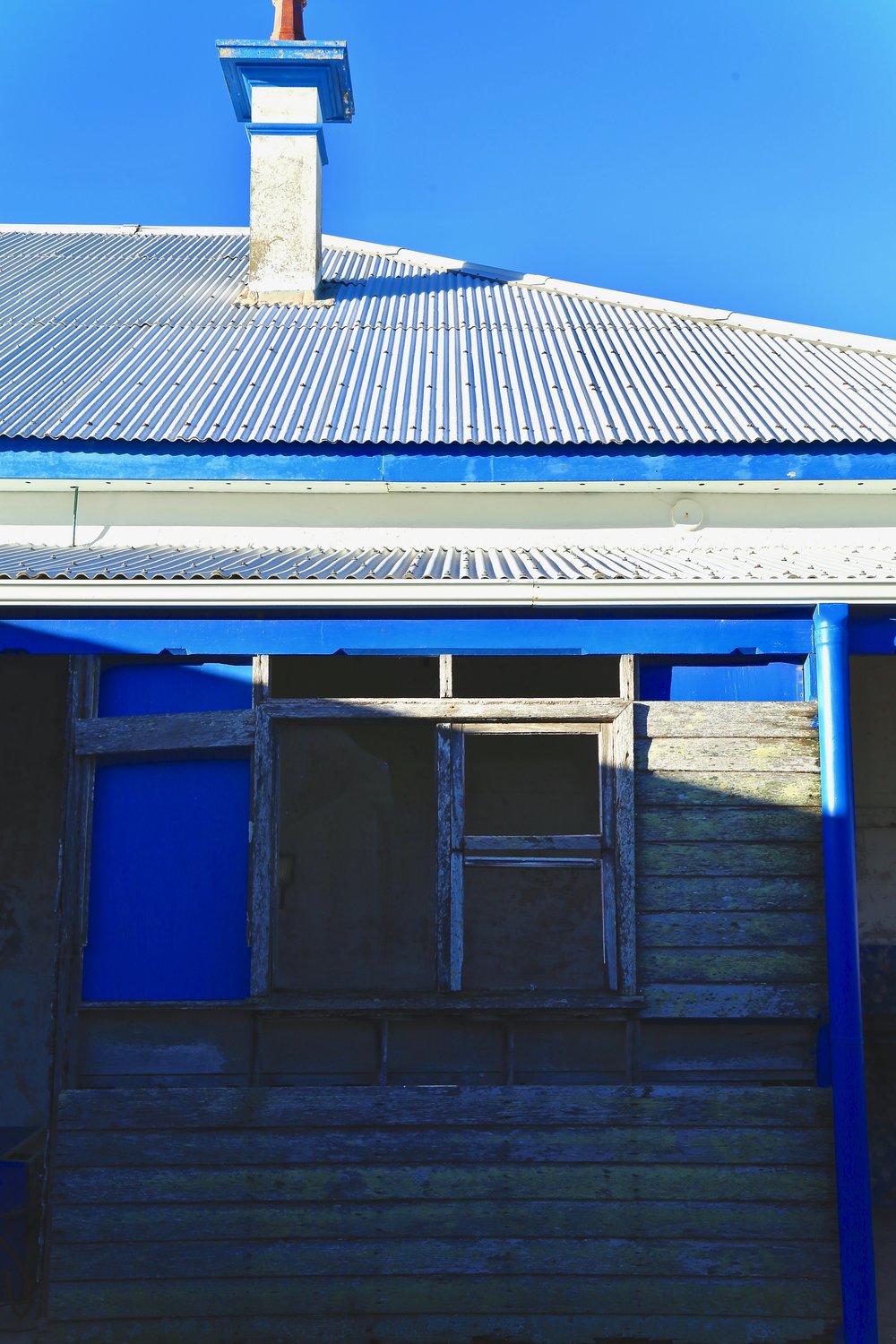 Chimney with wall and window treatments at the cottages, 6 May 2019
