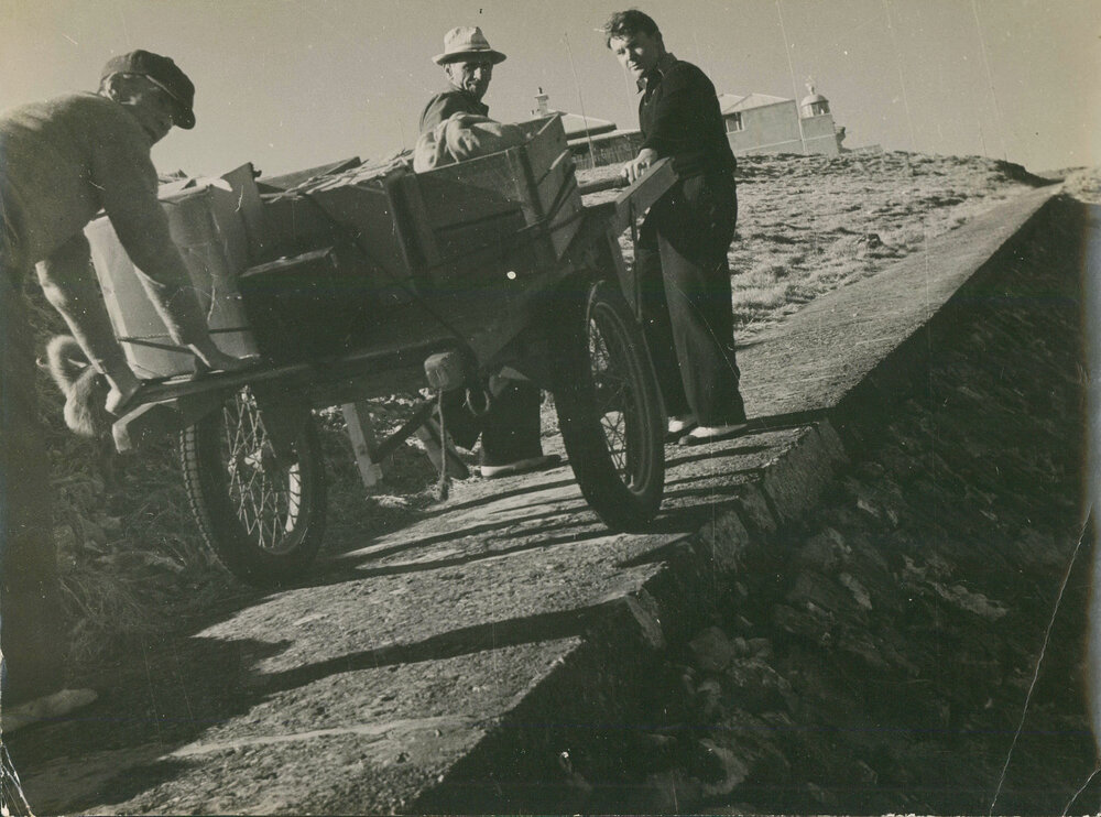 Hauling the supply cart from the gantry to the cottages on South Solitary Island, 1946