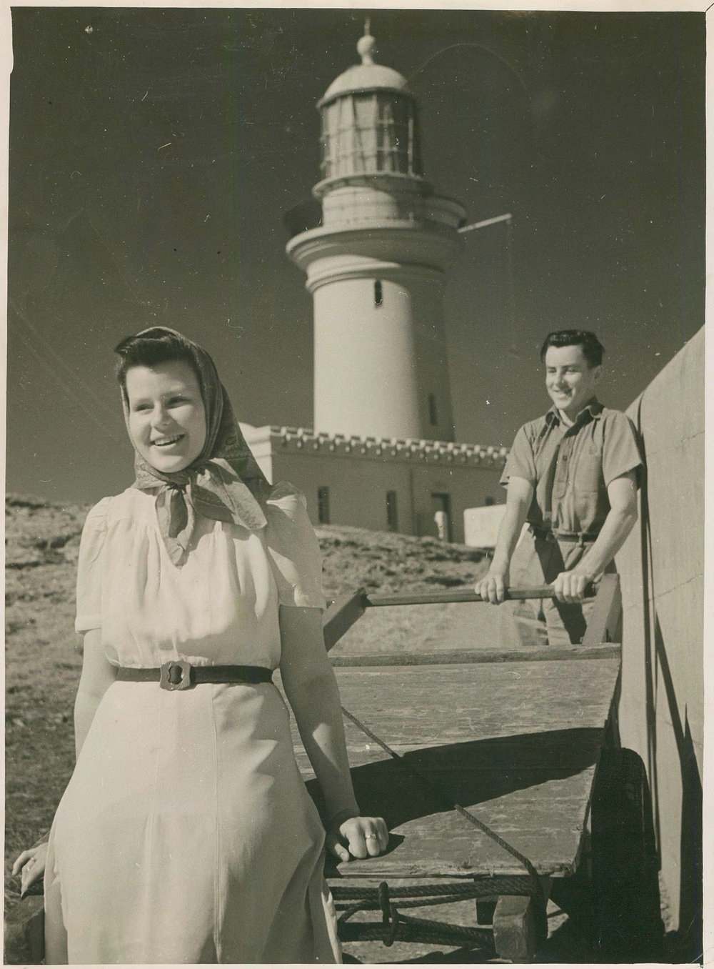 Beryl and Tom Duncan with the supply cart on South Solitary Island, 1946