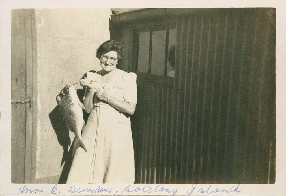 Mrs Ella Duncan with Good Friday dinner on South Solitary Island, 1946
