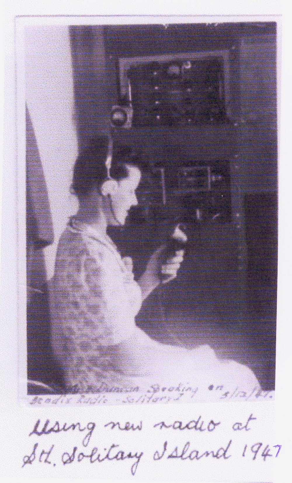 Beryl Duncan with the new Bendix radio on South Solitary Island, 5 December 1947