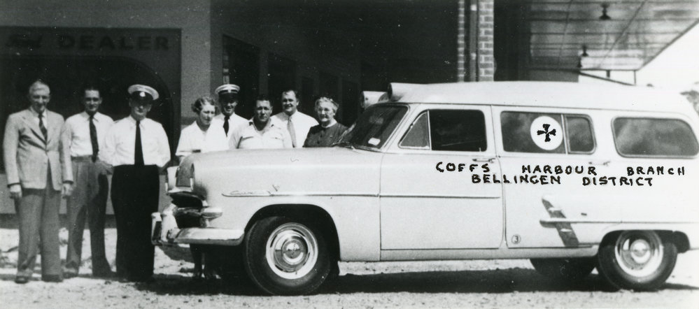 Handing over ceremony at Hacking Motors of a new ambulance, 17 December 1953