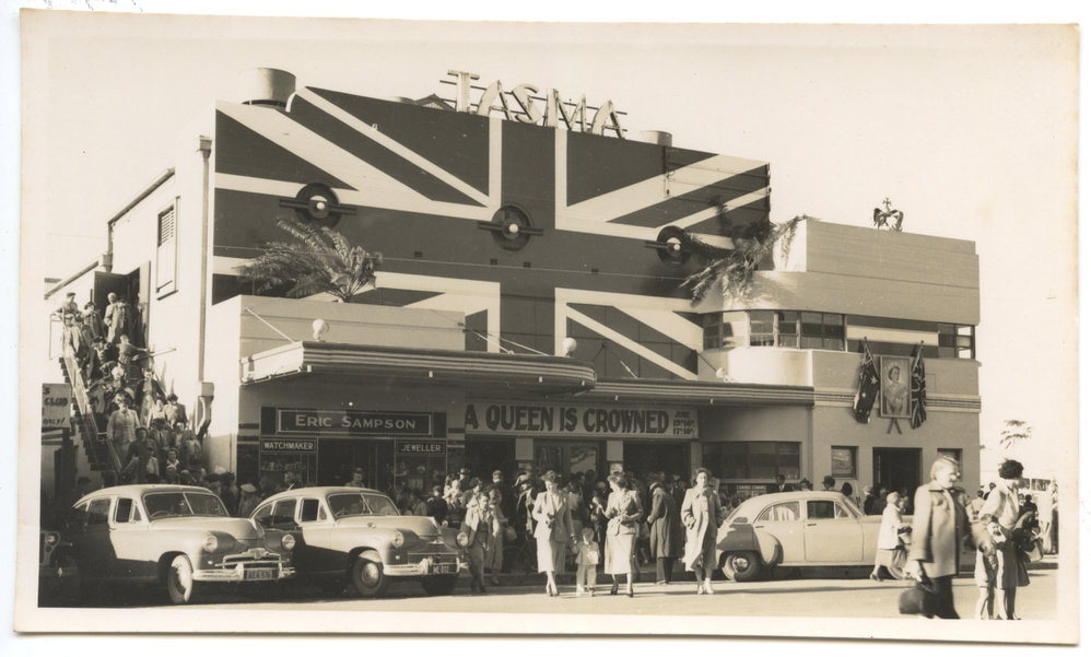 Tasma Theatre painted with the Union Jack with a large crowd c. 1953