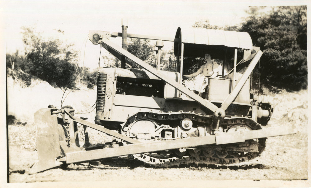 Photograph of Jessica Hill on Bull Dozer, c. 1950