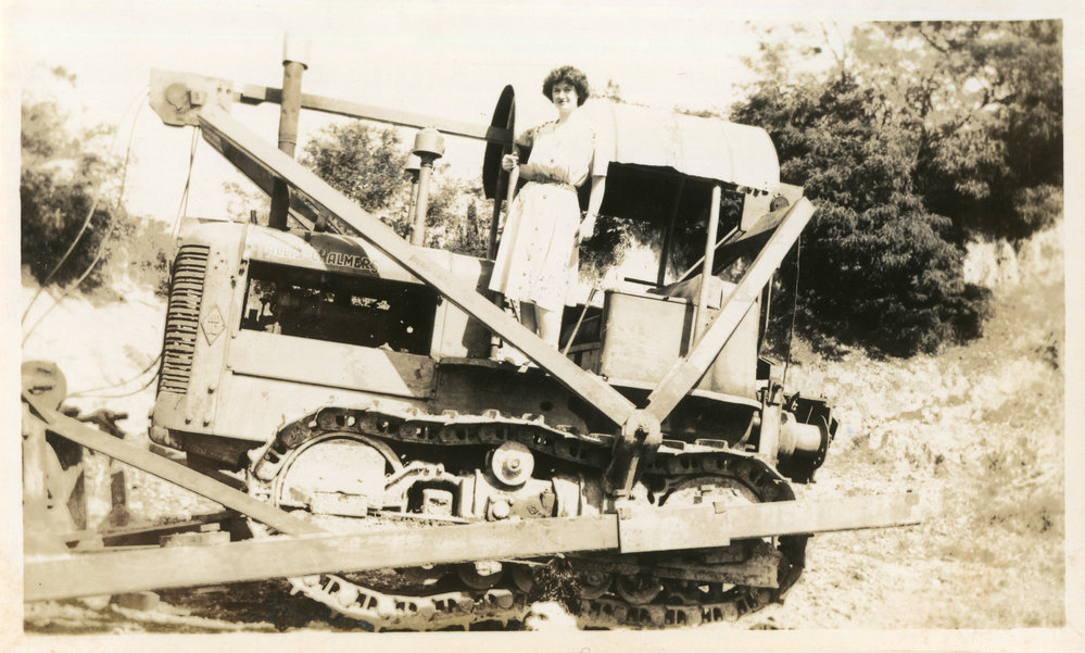 Photograph of Jessica Hill on Bull Dozer, c. 1950