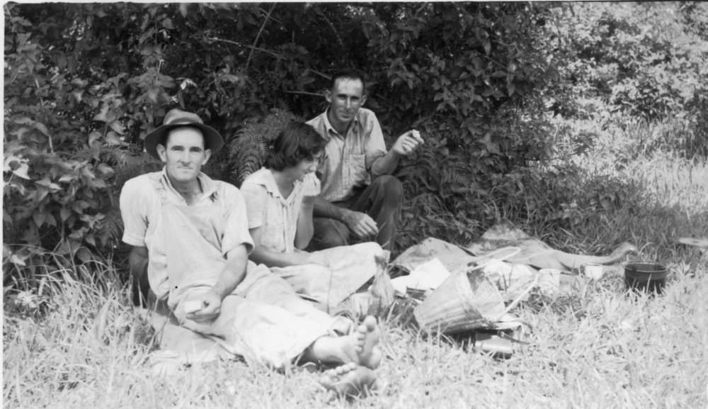 Tom Bishop with Noelene and Chris Lewthwaite in the pumpkin patch, 1950