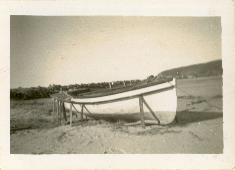 Stabilising a stranded fishing boat on Jetty Beach after a cyclone, 24 June 1950 