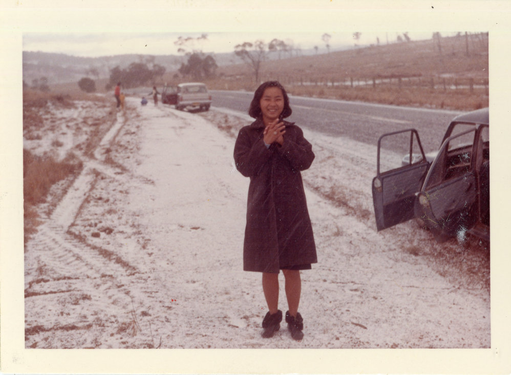 Rotary Club exchange student Kanit Sriangura in the snow on the road to Dorrigo, late 1960s
