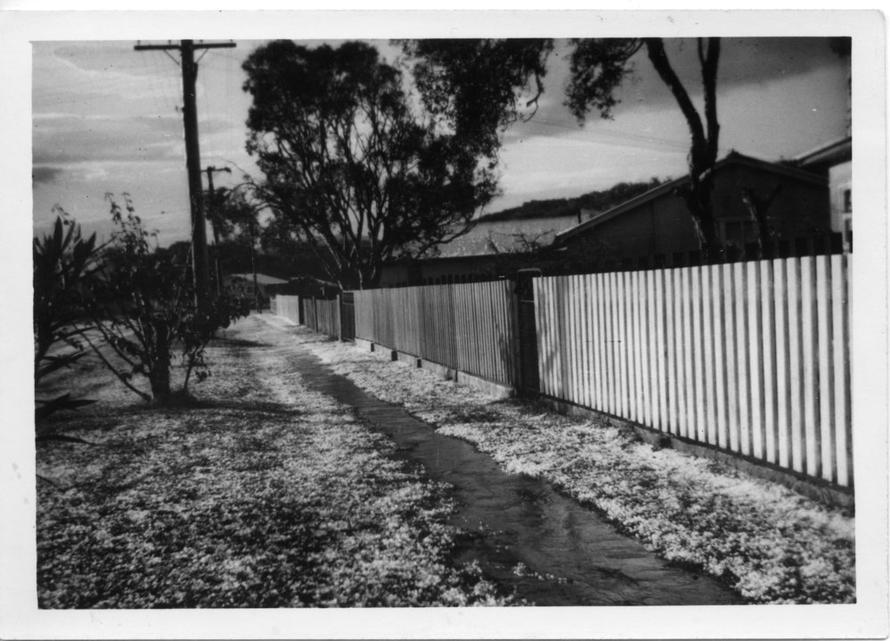 Hailstones outside the Griffiths' family shop, 1962