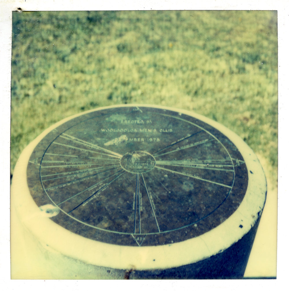 The directional plaque at Woolgoolga Headland, 25 July 2013