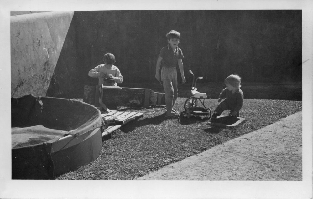 Fixing a go-cart on South Solitary Island, early 1970s
