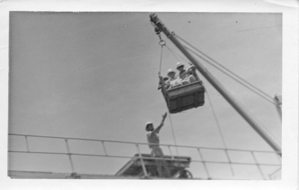 Transfer by crane and basket at South Solitary Island, early 1970s