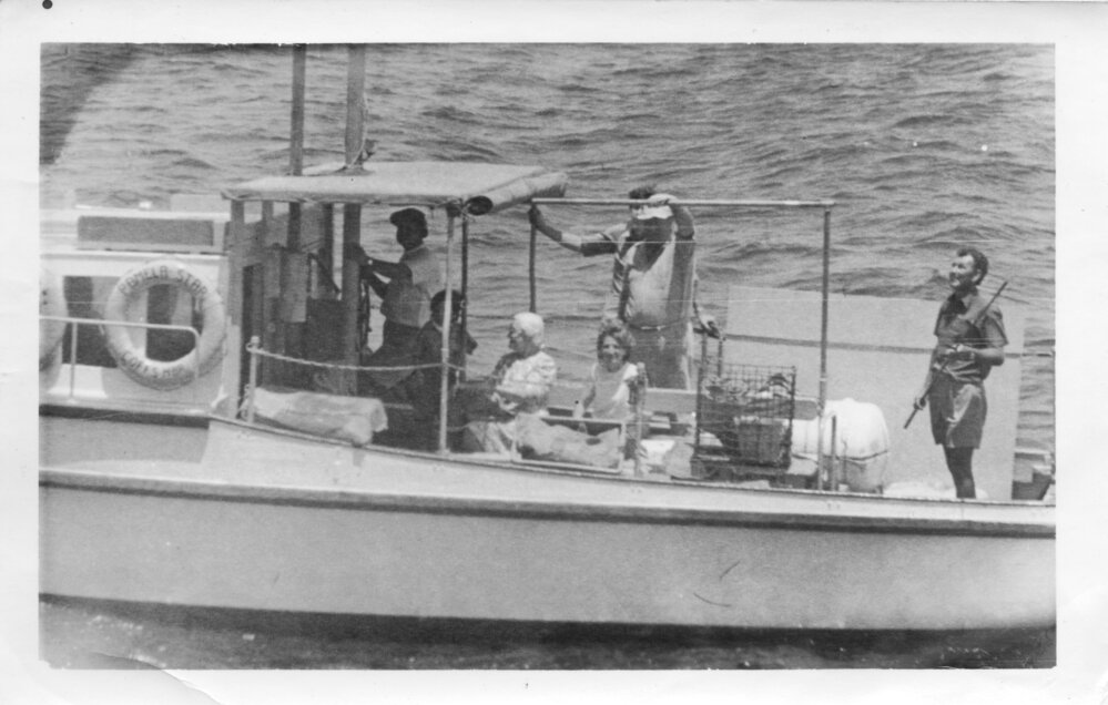 Peter Ross on the South Solitary Island supply boat Pamela Star, early 1970s